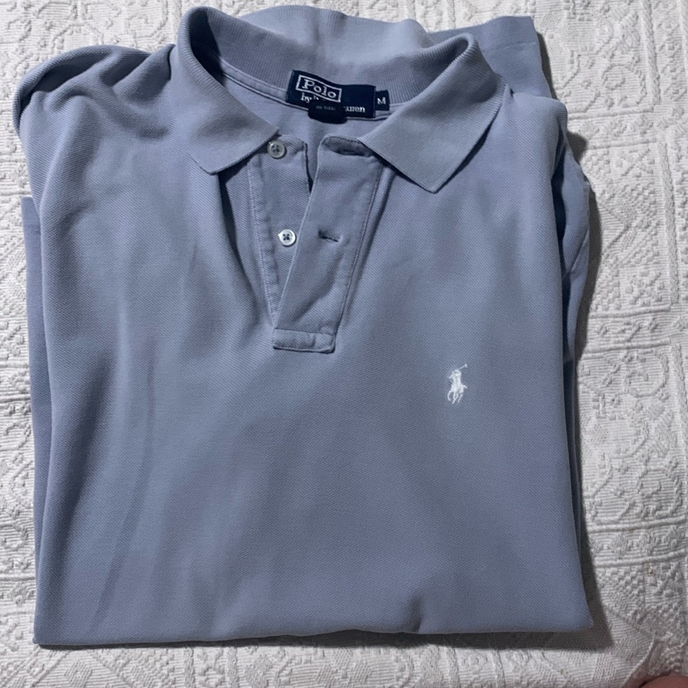 Light blue polo size medium